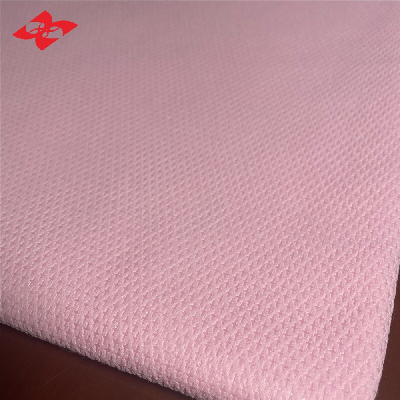 Suministro de Tela No Tejida de Polipropileno Spunbond Colorida de Diseño Cruzado de 65GSM